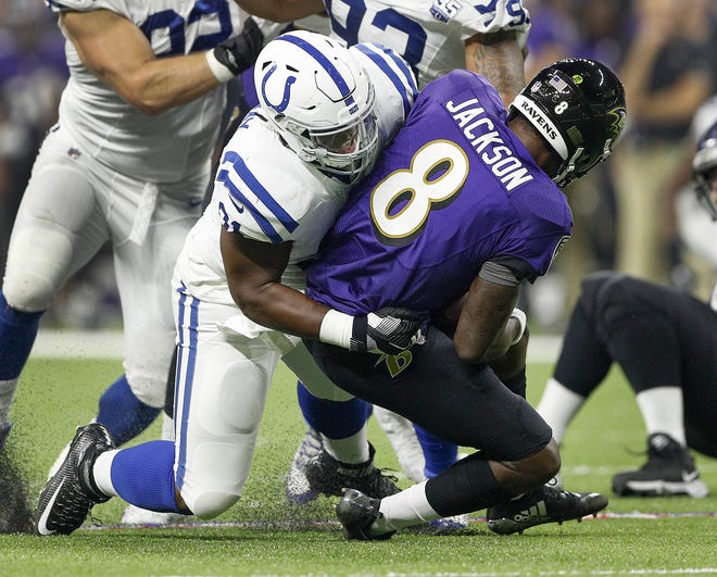 Indianapolis Colts defensive tackle Hassan Ridgeway (91) sacks Baltimore Ravens quarterback Lamar Jackson (8) in the first half of their preseason football game at Lucas Oil Stadium on MondayAug 20.