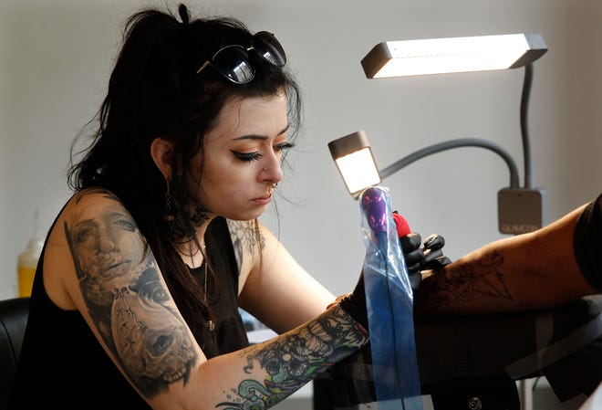 Tattoo artist shows fantastical designs on 'Ink Master' reality show