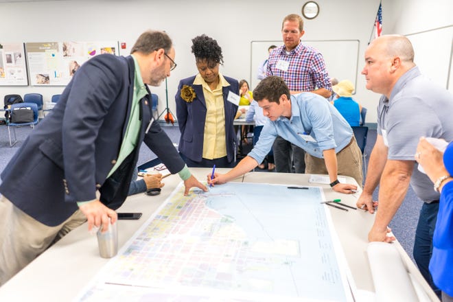 CivicCon speaker Gena Wirth and two colleagues from SCAPE collaborated with a group of local biologists, architects, conservationists, city and county staff and environmental attorneys about their desires for the waterfront in a CivicCon workshop on Tuesday, Aug. 21, 2018.