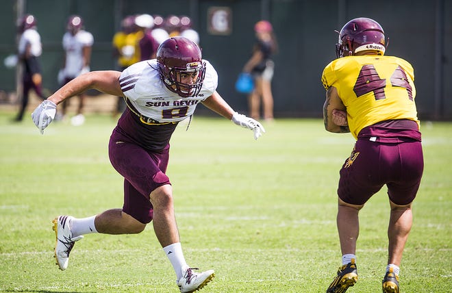 ASU linebacker Merlin Robertson, left, runs during practice in Tempe, Tuesday, August 21, 2018. Robertson could be one of many newcomers to see action in the season opener.