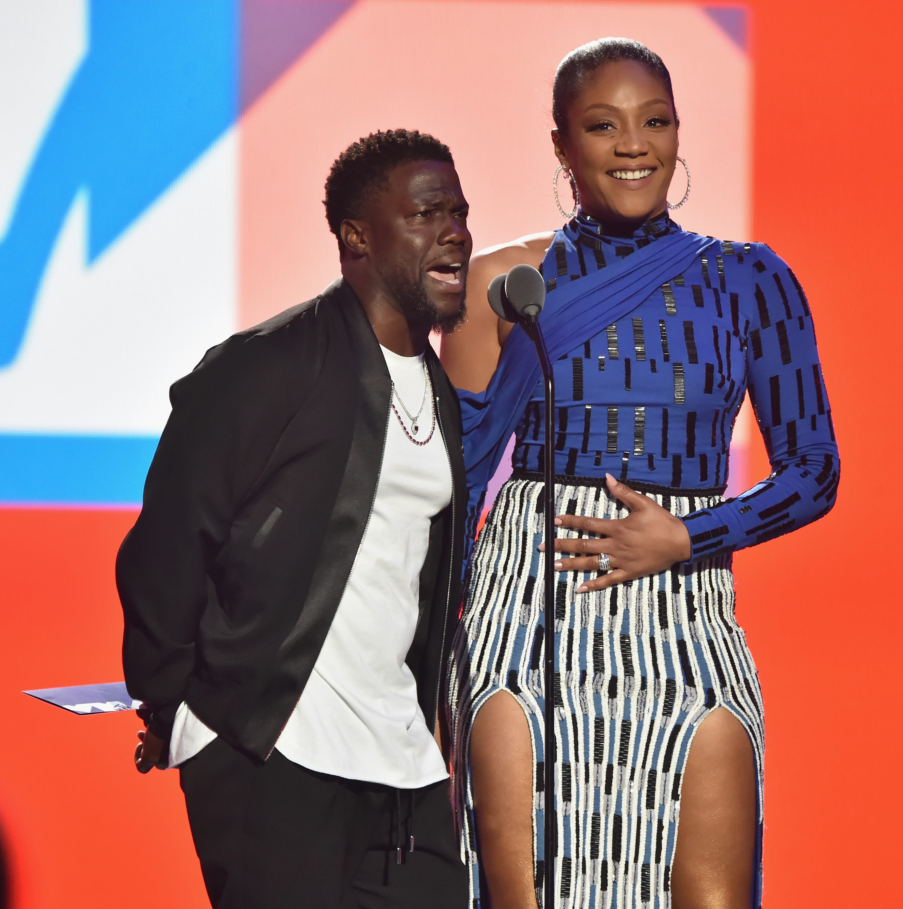 Kevin Hart and Tiffany Haddish speak onstage during the 2018 MTV Video Music Awards at Radio City Music Hall on August 20, 2018 in New York City.