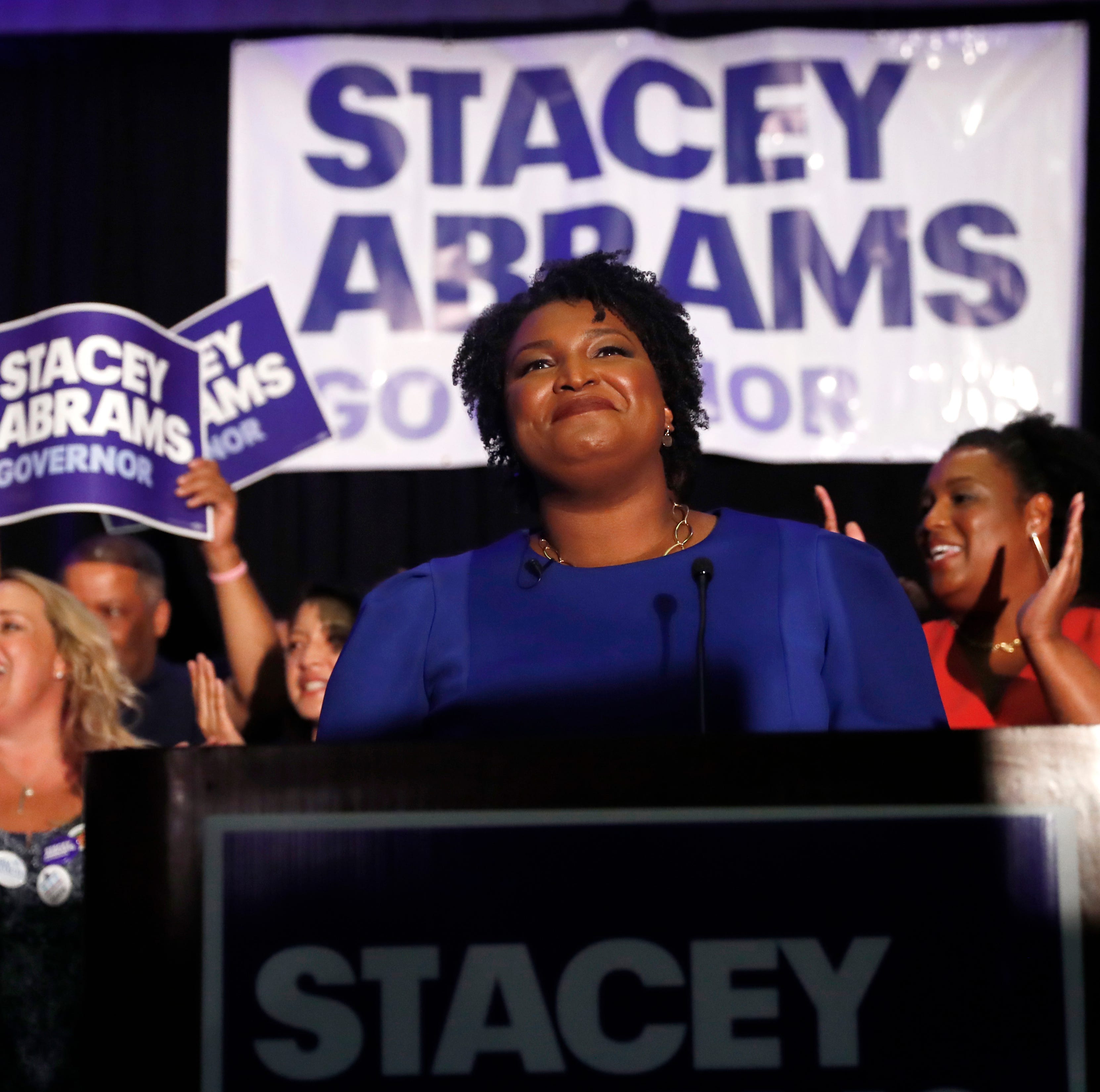 Georgia Democratic gubernatorial candidate Stacey Abrams smiles before speaking to supporters during an election-night watch party on May 22, 2018, in Atlanta. More women than ever before have won primaries for governor, U.S. Senate and House this ye