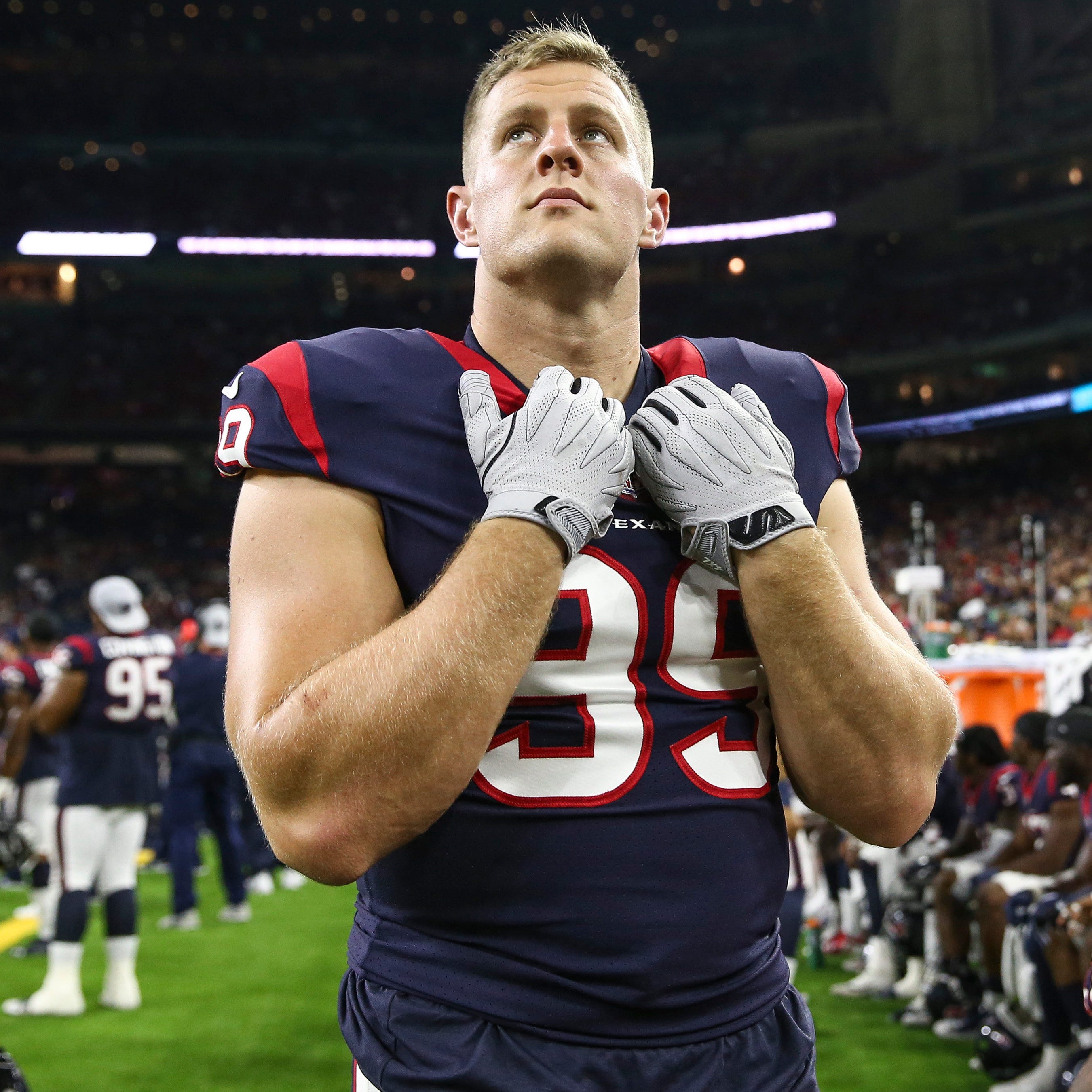 Houston Texans defensive end J.J. Watt (99) walks on the sideline during the second half against the San Francisco 49ers at NRG Stadium.