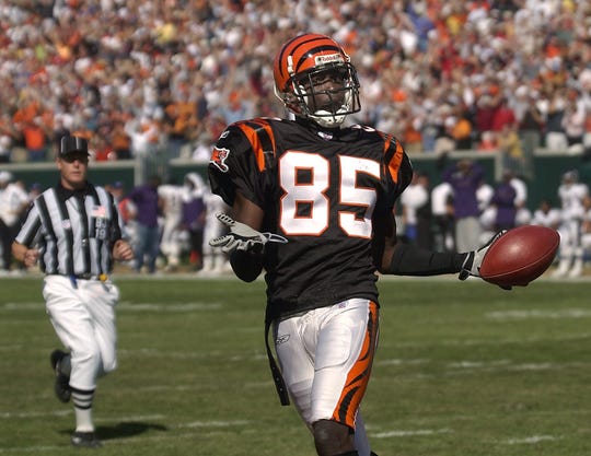 SUNDAY OCTOBER 19, 2003 BENGALS SPORTS Chad Johnson celebrates in the end zone after a touchdown catch. Johnson caught 130 yards in passes for the day. The Cincinnati Bengals defeated the Baltimore Ravens 34-26 at Paul Brown Stadium. Cincinnati Enquirer/Michael E. Keating mek