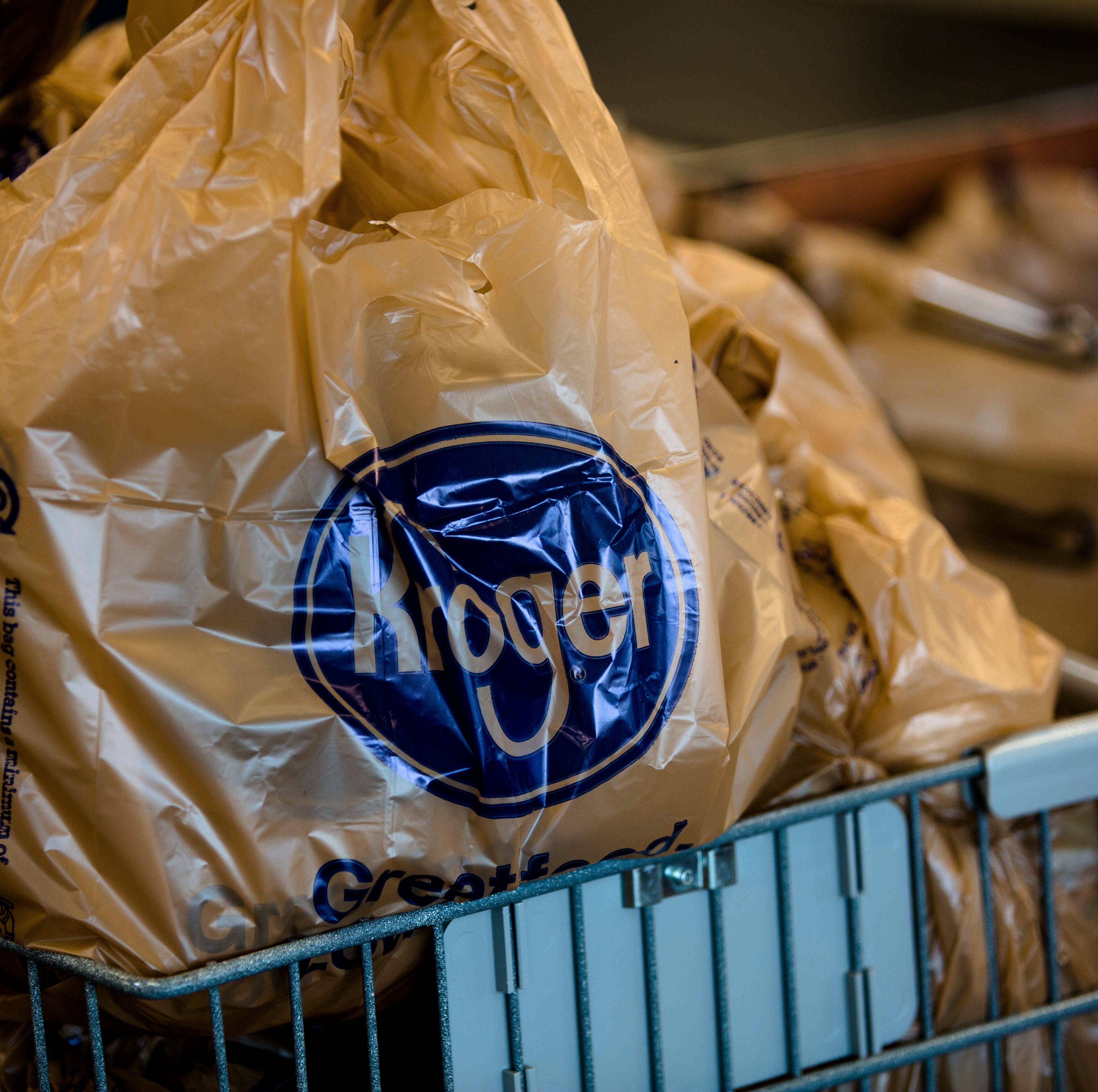 Kroger bags full of items sit in a cart at Kroger in Newport, Ky., on Wednesday, Aug. 22, 2018.
