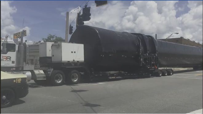 Shrink-wrapped SpaceX body coasts through Blountstown