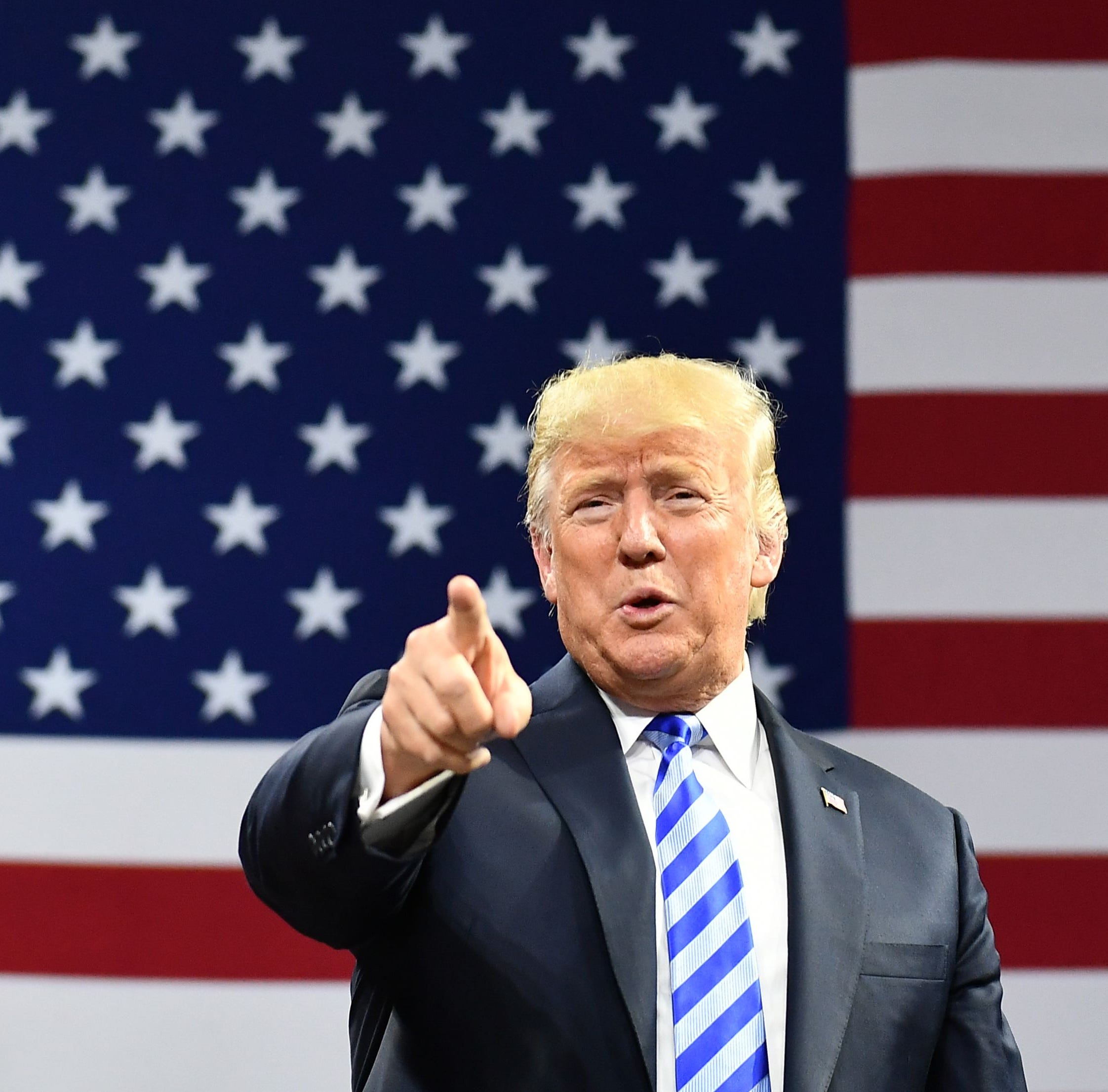 TOPSHOT - US President Donald Trump arrives for a political rally at Charleston Civic Center in Charleston, West Virginia, on August 21, 2018. (Photo by MANDEL NGAN / AFP)MANDEL NGAN/AFP/Getty Images ORG XMIT: US Presid ORIG FILE ID: AFP_18I6TF
