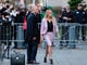 Porn actress Stormy Daniels, accompanied by her attorney, Michael Avenatti, left, leaves federal court, Monday, April 16, 2018 in New York. A U.S. judge listened to more arguments about President Donald Trump's extraordinary request that he be allowed to review records seized from his lawyer, Michael Cohen, office as part of a criminal investigation before they are examined by prosecutors. The raid carried out last Monday at Cohen's apartment, hotel room, office and safety deposit box sought bank records, records on Cohen's dealing in the taxi industry, Cohen's communications with the Trump campaign and information on payments made in 2016 to former Playboy model Karen McDougal and to Daniels. (AP Photo/Seth Wenig) ORG XMIT: NYSW307