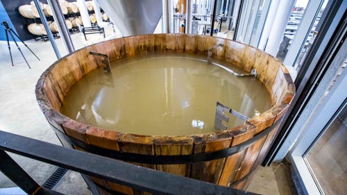 Woody, a 550-gallon open-top cypress fermentation tank ay Foundry Distilling Co., at their new facility and distillery Friday, Aug. 24, 2018, in West Des Moines.