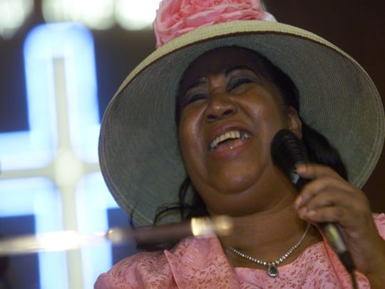 Aretha Franklin belts out a gospel song during a tribute to her father the late Rev. C.L Franklin at the New Bethel Baptist Church in Detroit on Sunday, July 29, 2001.