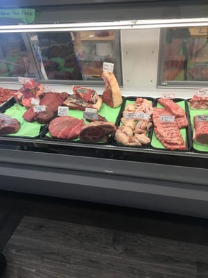 A display case at new butcher, Friendly Nick's Butcher.