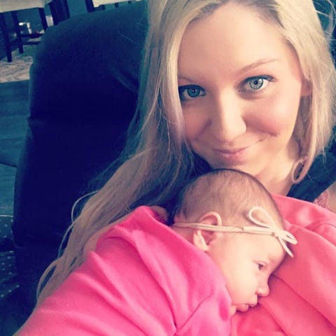 Lacey Guyton with her daughter, Raina, who was...