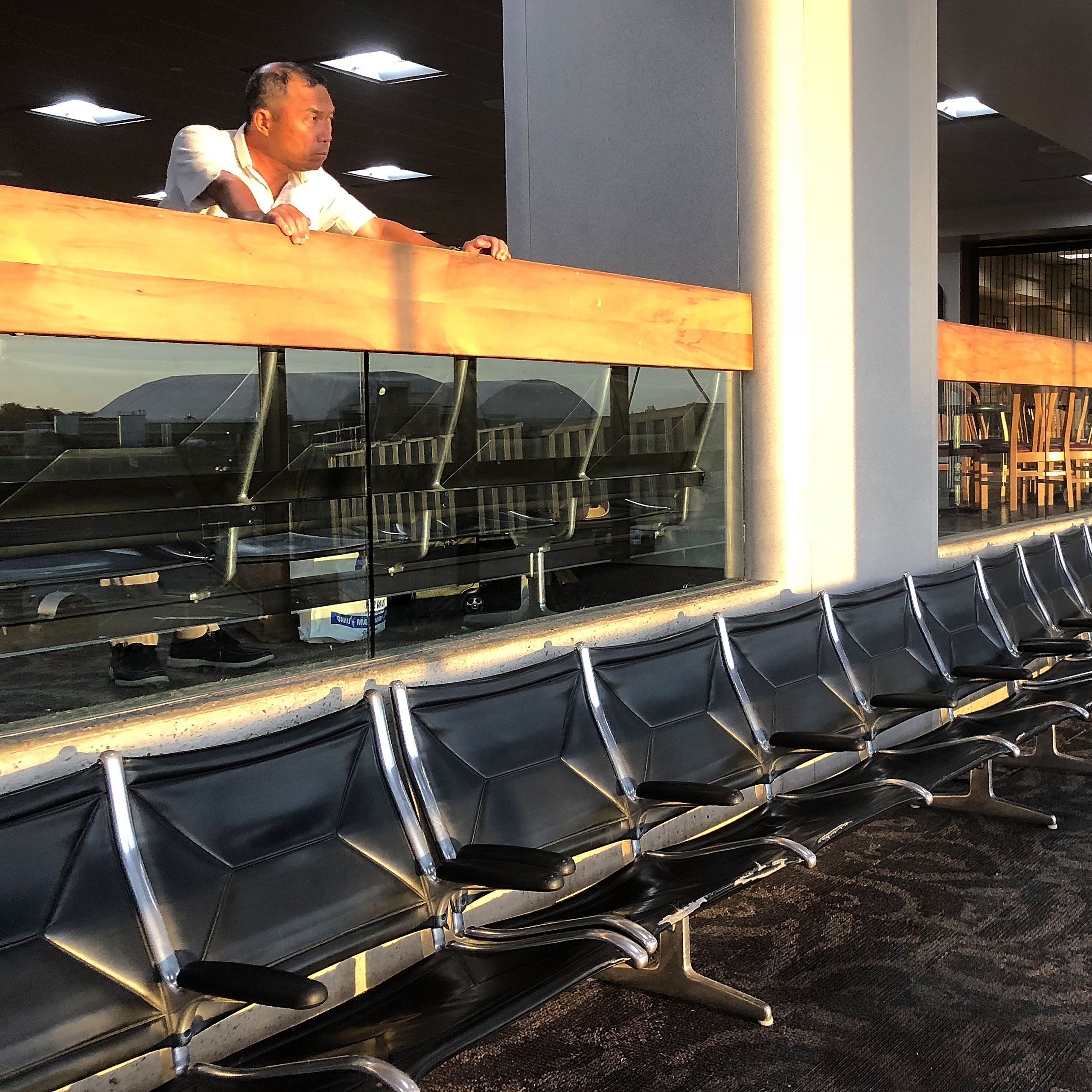 A lounge at Honolulu's Daniel K. Inouye International Airport sits mostly empty as Hurricane Lane approaches the island chain on August 22, 2018 .