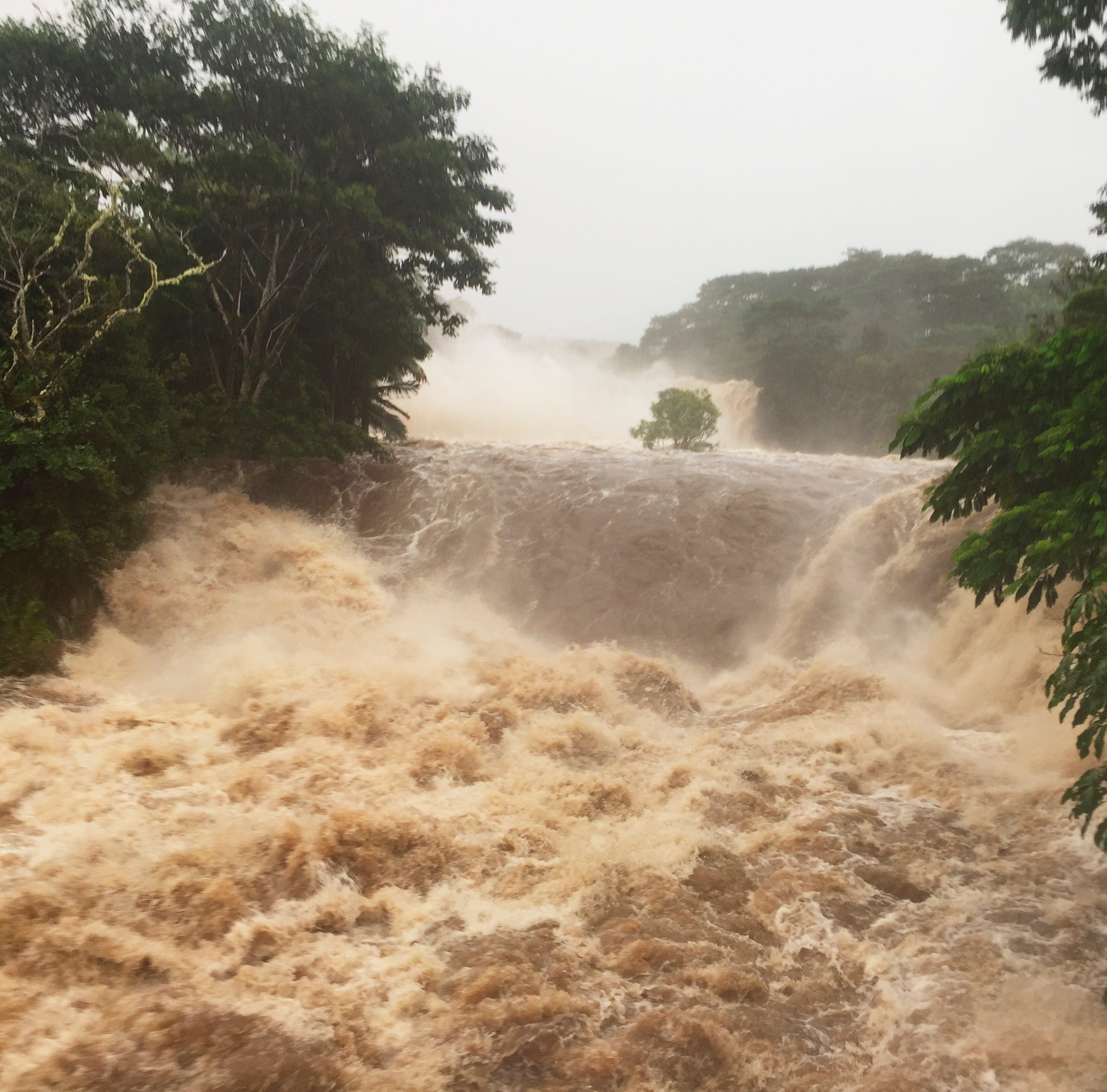 Flooding Thursday, Aug. 23, 2018, on the Wailuku River near Hilo, Hawaii. Hurricane Lane brought torrential rains to Hawaii's Big Island and Maui before the storm was expected to hit Oahu. A powerful hurricane unleashed torrents of rain and landslide