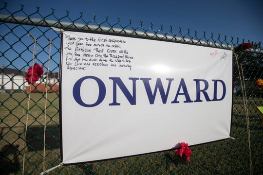 Signs line the Harvey Grateful Fence during a remembrance ceremony for the anniversary of Hurricane Harvey on Friday, Aug. 24, 2018, at the Texas Maritime Museum in Rockport.