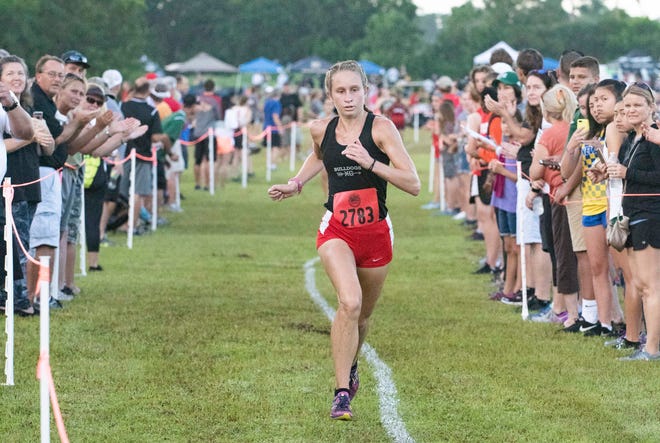 South Fork junior Hannah Martin makes her way to the finish line Saturday, August 25, 2018, during the Fleet Feet Invitational cross-country meet at South Fork High School in Stuart. Martin came in second with a time of 20:30.77. Emma Cavendish, not pictured, of Dwyer won the race with a time of 19:49.50. To see more photos, go to TCPalm.com.