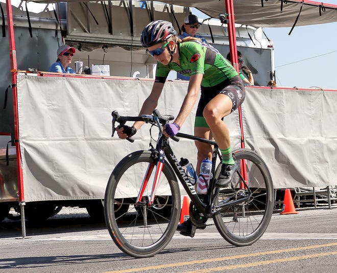 Wolfpack's Leigh Ann Ganzar finishes the women's cat 1-2-3 in first with a time of 2:59;14 Saturday, Aug. 25, 2018, at the Hotter'N Hell Hundred race finish at 310 Texas 79.