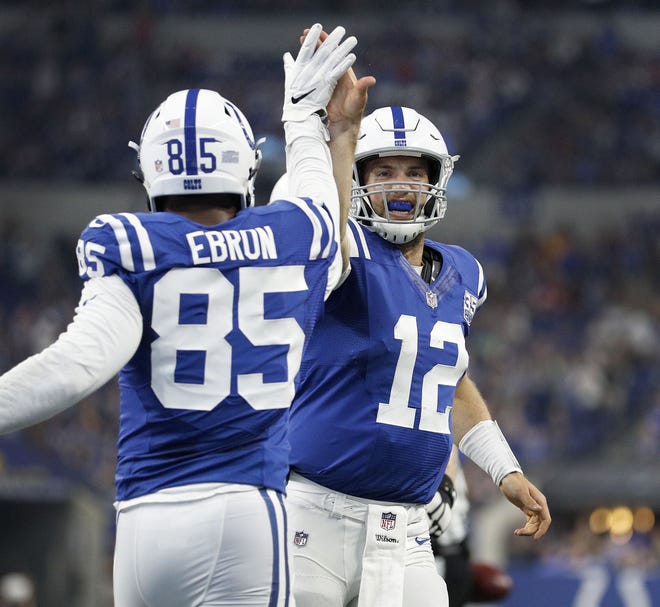 Indianapolis Colts tight end Eric Ebron (85) celebrates his touchdown with Andrew Luck (12) in the first half of their preseason football game at Lucas Oil Stadium Saturday, August 25, 2018.
