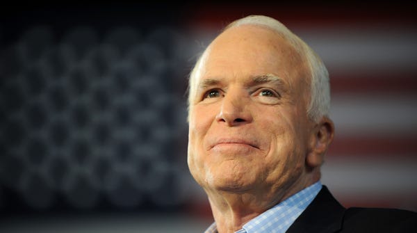 In this file photo taken on September 5, 2008 Republican presidential candidate John McCain pauses while addressing a campaign event at the Freedom Hill Ampitheatre in Sterling Heights, Michigan.