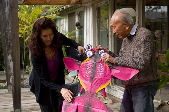 Tyrus Wong (right) with Pamela Tom, a fifth-generation Chinese American producer, director and screenwriter who produced a documentary about Wong in 2015 titled “Tyrus.”