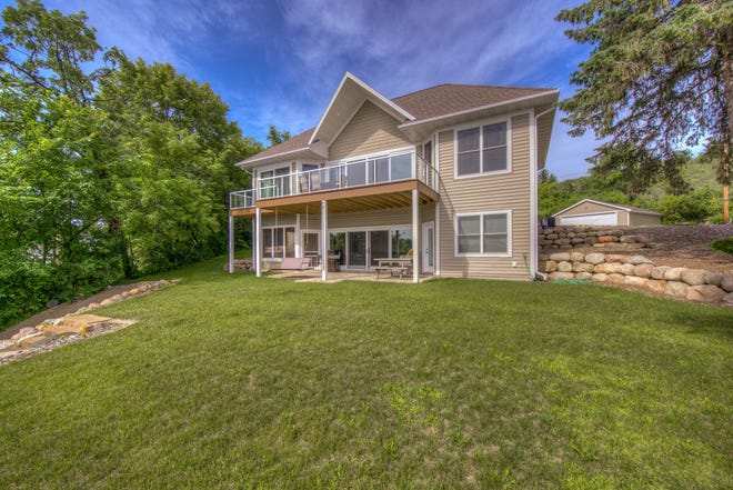 This home on West Lake Sylvia offers waterfront views from all its main gathering areas.