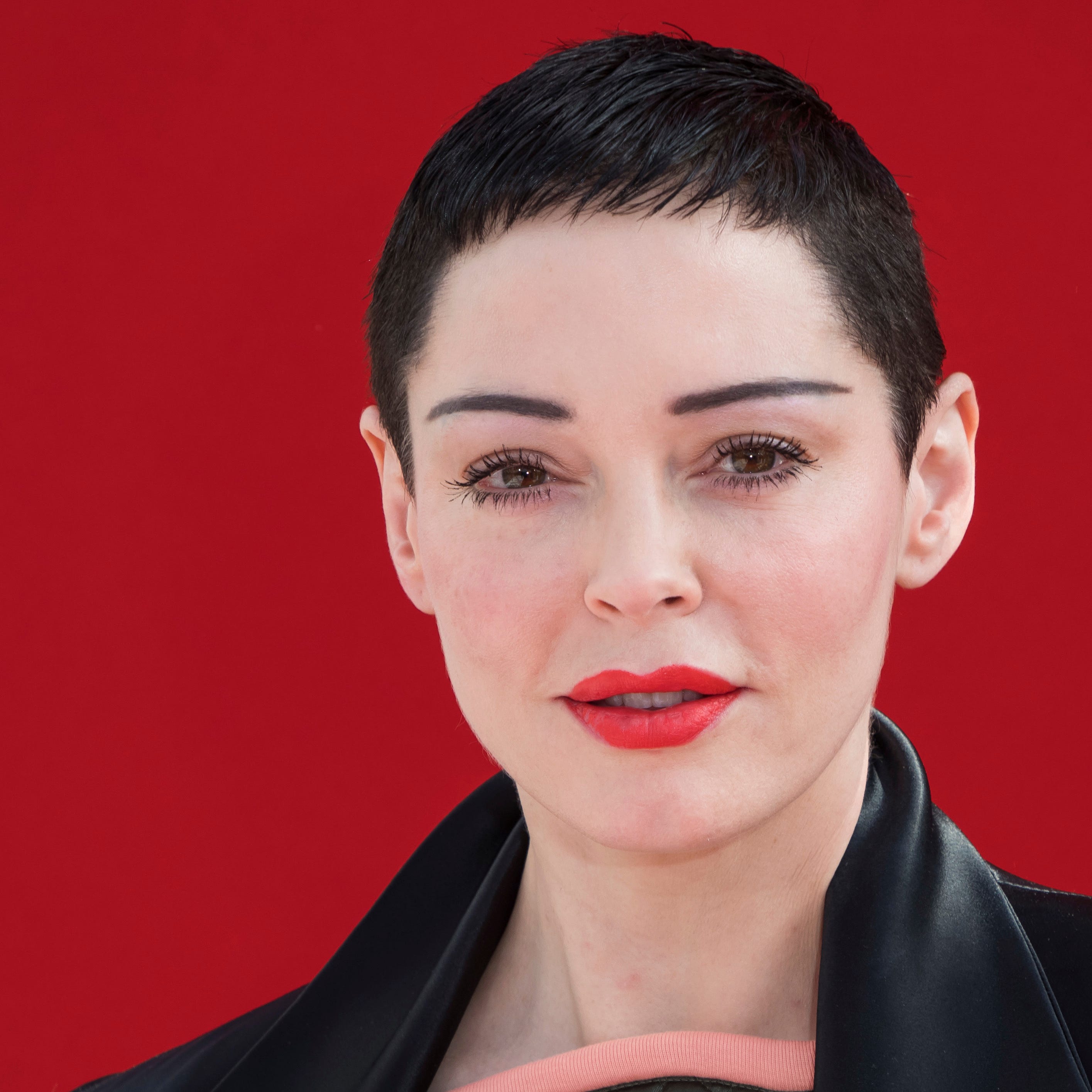 Rose McGowan poses before a fashion show in Paris, March 3, 2018.