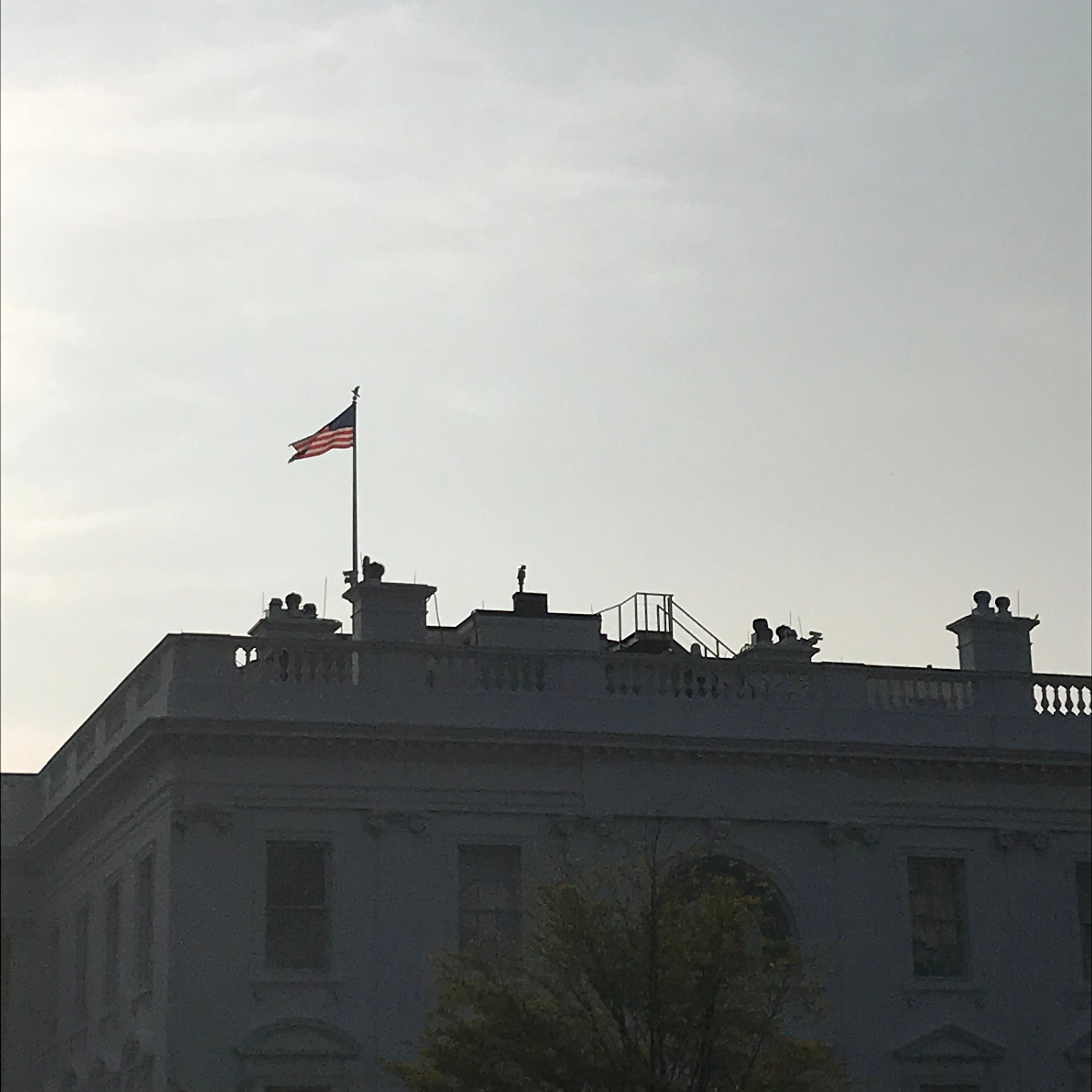 The U.S. flag flies full staff at the White House on Monday, Aug. 27, less than two days after Sen. John McCain died.