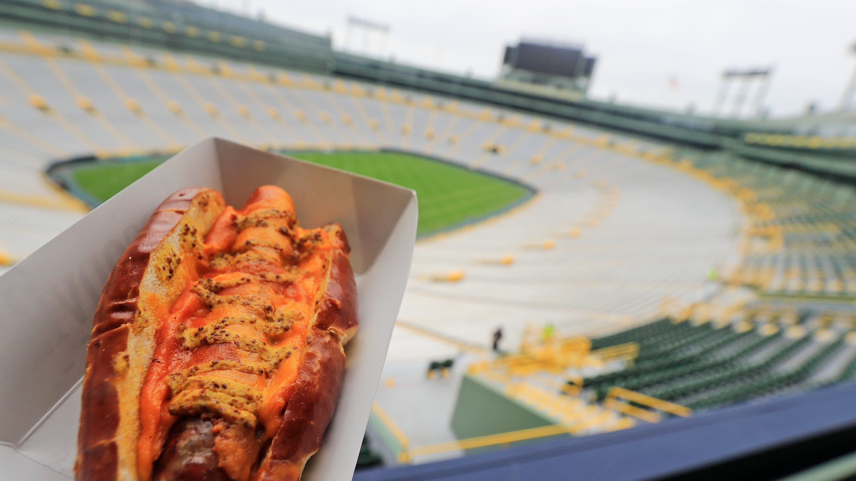Packers new Lambeau Field foods led by brat topped by curds