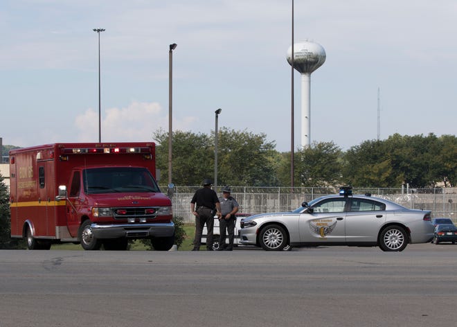 An ambulance leaves the Ross Correctional Institution with a patient possibly exposed to opioids in Chillicothe Wednesday afternoon.