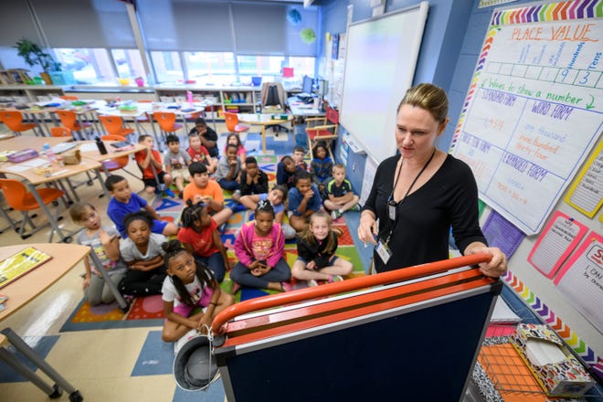 Third-grade teacher Celeste Brown teaches a math lesson Wednesday at Madison Heights Elementary School.