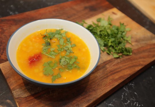 Squash, Leek, and Chickpea Soup with chopped cilantro is a vegetarian soup for celebrating the Jewish New Year.