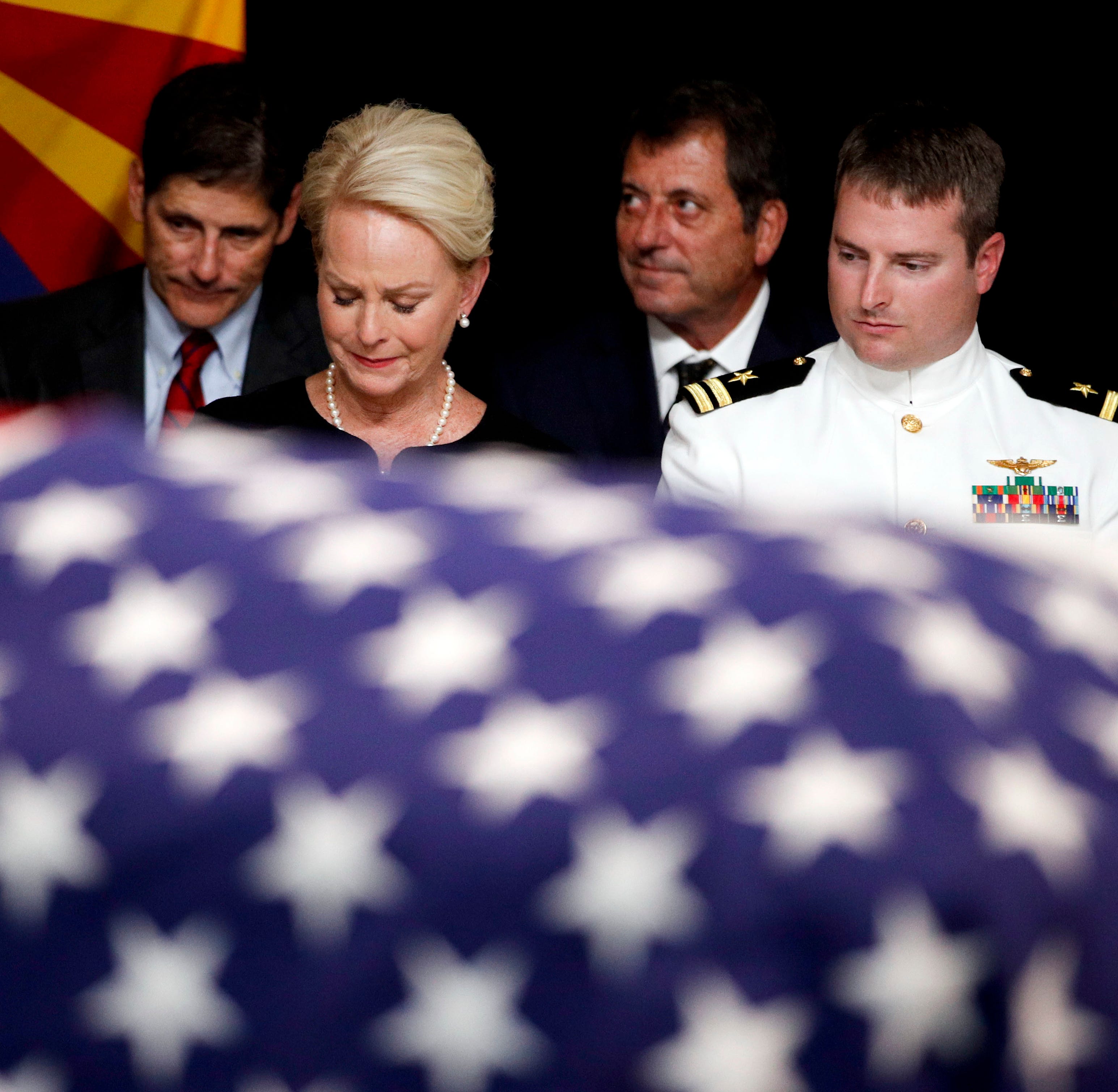 Cindy McCain, wife of Sen. John McCain, R-Ariz., sits with her son Jack during a memorial service at the Arizona Capitol on Aug. 29, 2018, in Phoenix.