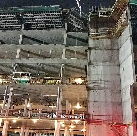 The construction site where two workers fell to their deaths when scaffolding collapsed above the sixth floor of a hotel that is being built near Disney World in Orange County.