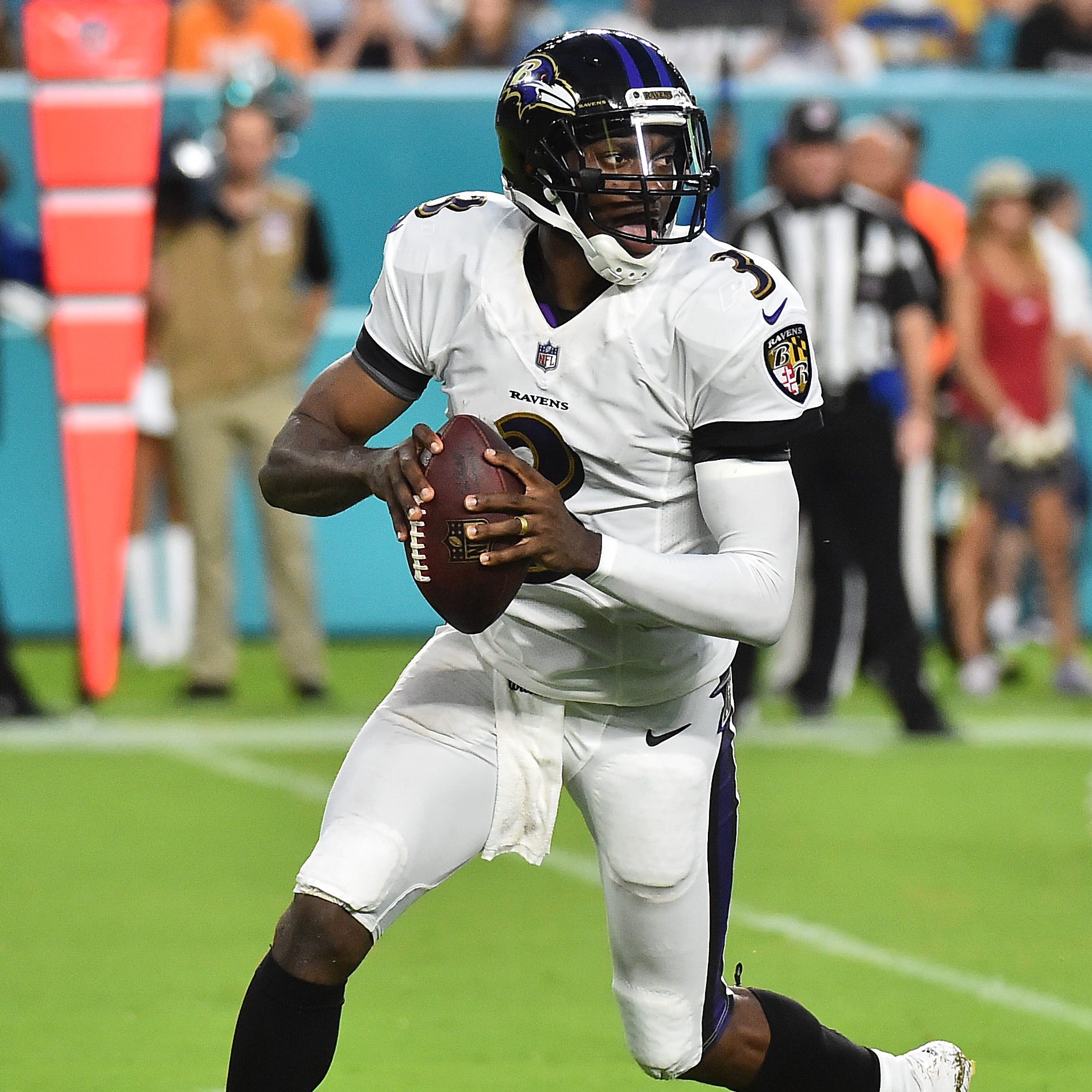 Baltimore Ravens quarterback Robert Griffin III (3) drops back to attempt a pass against the Miami Dolphins during the first half at Hard Rock Stadium.
