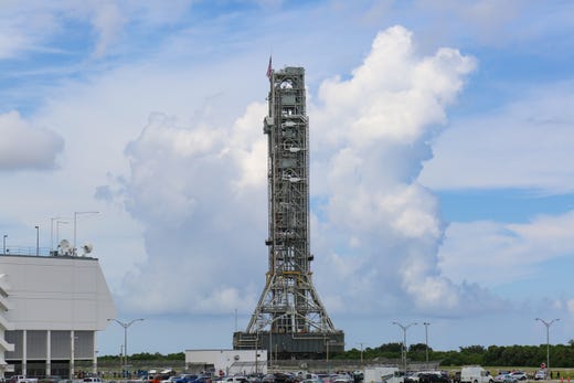 NASA teams, using the historic crawler-transporter, slowly move the mobile launcher from Kennedy Space Center's Vehicle Assembly Building to pad 39B on Thursday, Aug. 30, 2018. The mobile launcher will eventually host the agency's Space Launch System rocket.