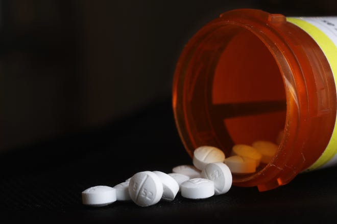 This Wednesday, Aug. 29, 2018 photo shows an arrangement of Oxycodone pills in New York. A study in Tennessee released on Thursday, Aug 30, 2018, found learning disabilities and other special education needs are more common in young children who were born with symptoms from their mothers' prenatal opioid use. The results bolster evidence of long-term consequences for infants caught in the nation's opioid epidemic.