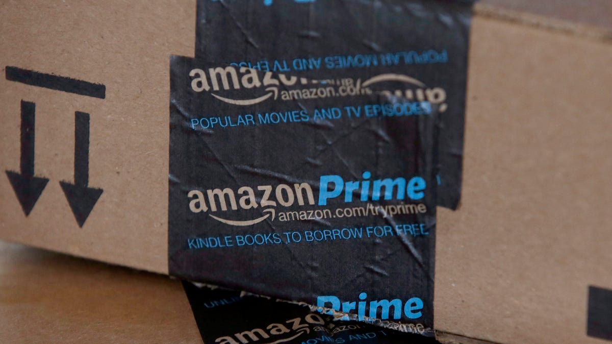 FILE - This June 4, 2014 file photo shows Amazon boxes in Phoenix. Amazon reports quarterly financial results on Thursday, July 23, 2015. (AP Photo/Ross D. Franklin) ORG XMIT: NYBZ109