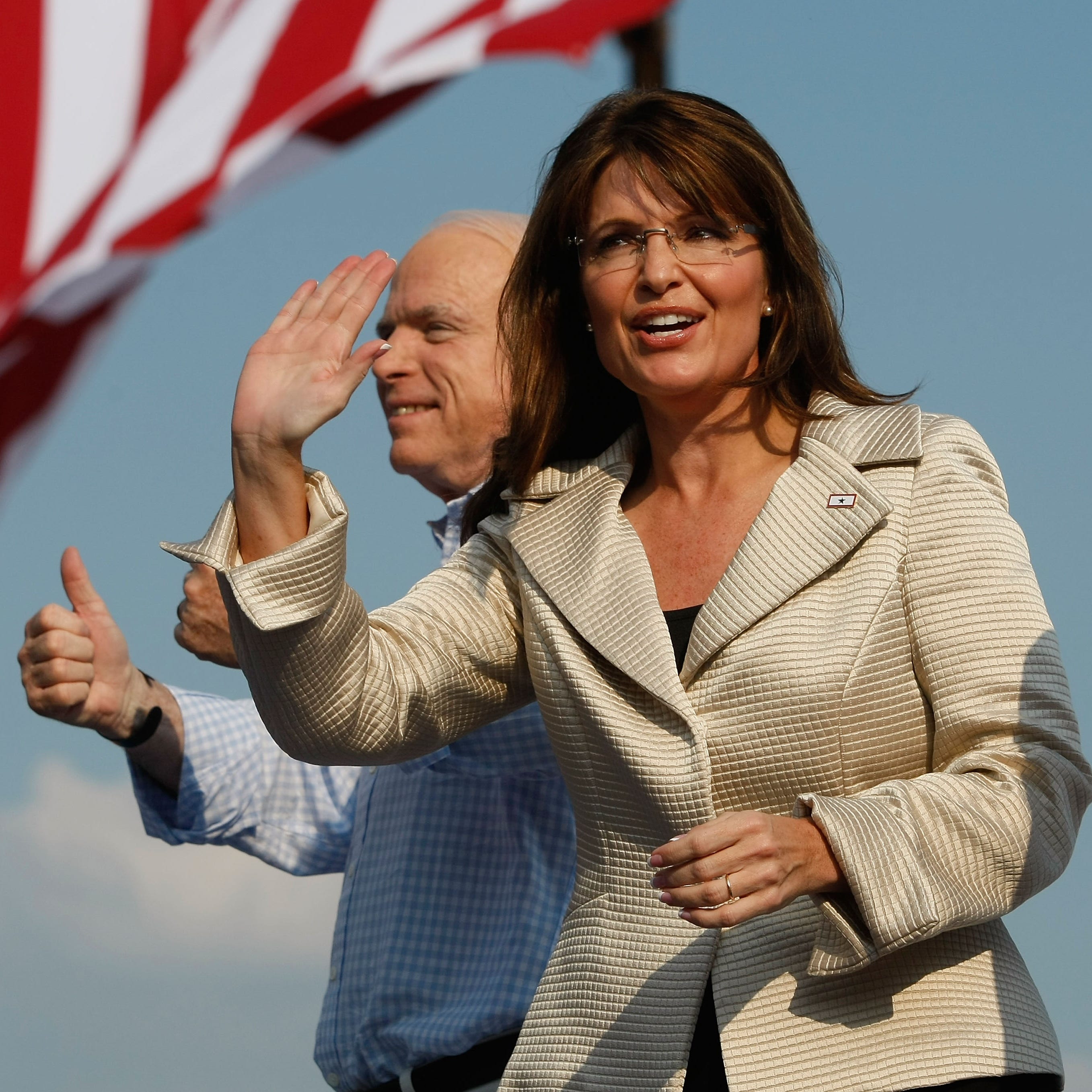 2008 Republican presidential nominee Sen. John McCain. R-Ariz., and vice-presidential nominee, former Alaska Gov. Sarah Palin, greet the crowd at a rally at T.R. Hughes Ballpark Aug. 31, 2008, in O'Fallon, Missouri.