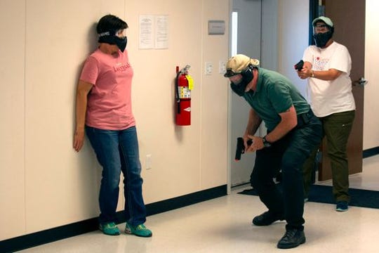 School teachers and administrators participate in an active shooter drill June 28 in Commerce City, Colorado.