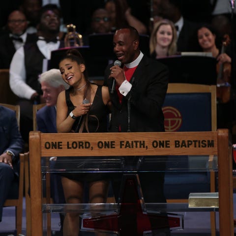 Bishop Charles H. Ellis III jokes with Ariana...