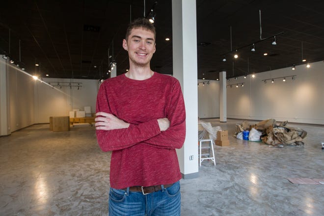 Patrick Hagan gives a tour of a new space that will be home to startups on Friday, Aug. 31, 2018, in the Iowa River Landing in Coralville.