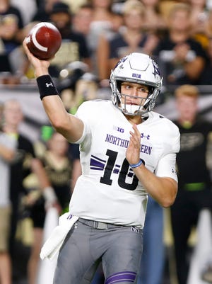 Northwestern quarterback TJ Green with a pass against Purdue in the first quarter Thursday, August 30, 2018, in West Lafayette. 
