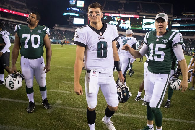 Eagles' Christian Hackenberg (8) heads toward the locker room after the Eagles defeated the Jets 10-9 Thursday at Lincoln Financial Field. 