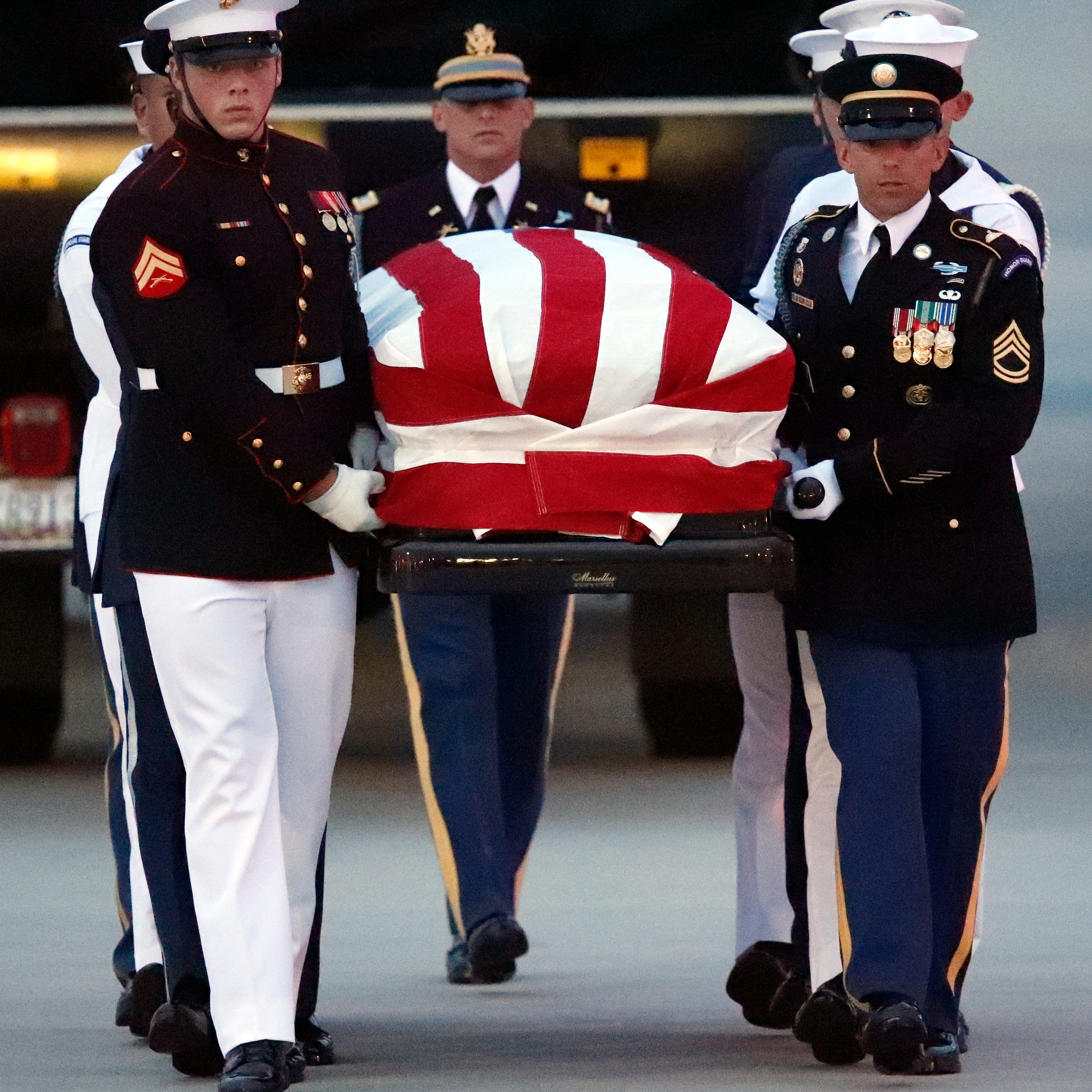 The flag-draped casket of Sen. John McCain, R-Ariz., is carried by an Armed Forces body bearer team to a hearse, Aug. 30, 2018, at Andrews Air Force Base, Md.