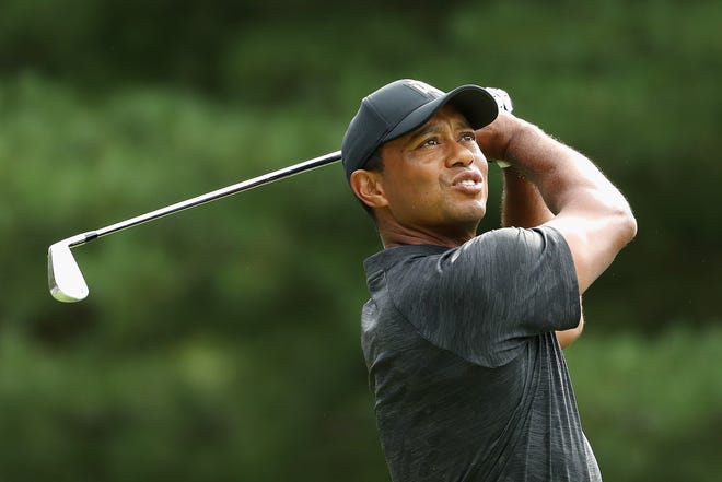 Tiger Woods plays his shot from the 11th tee during the first round of the Dell Technologies Championship at TPC Boston on Aug, 31, 2018 in Norton, Massachusetts.
