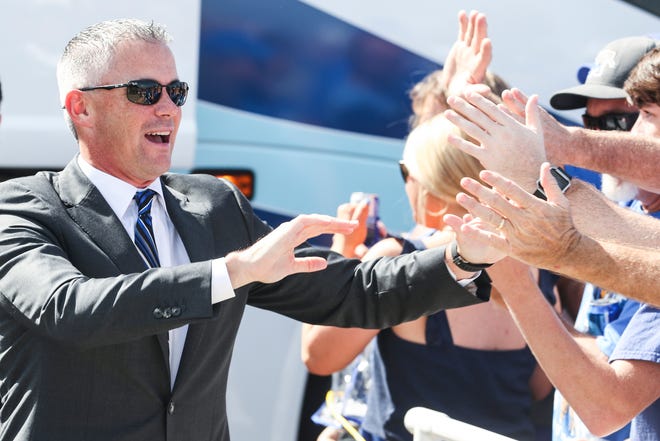 September 01 2018 - Mike Norvell, head football coach at the University of Memphis, greets fans at the start of Tiger Walk before Saturday's game versus Mercer at the Liberty Bowl Memorial Stadium.