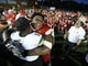 Marquis Morris, of Bergen Catholic, gives a Grayson player a big hug after he came over to congratulate the Crusaders.   Friday, August 31, 2018