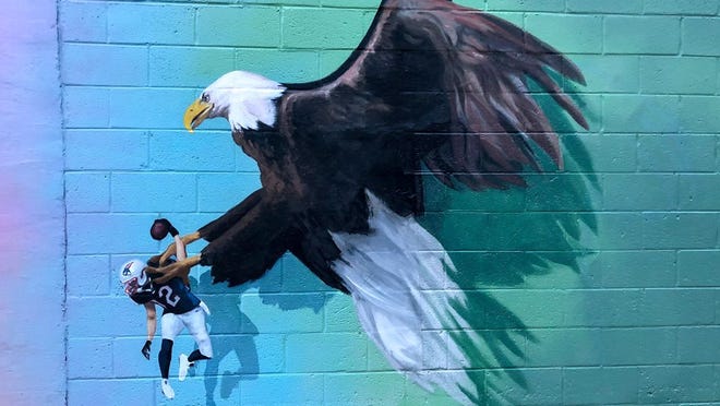 This painting inspired a new mural featuring the Lombardi Trophy instead of a hapless Tom Brady.