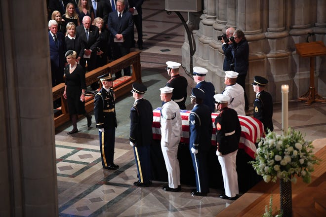 Cindy McCain arrives with with the casket of her husband, Saturday, during the at the National Cathedral in Washington, DC.