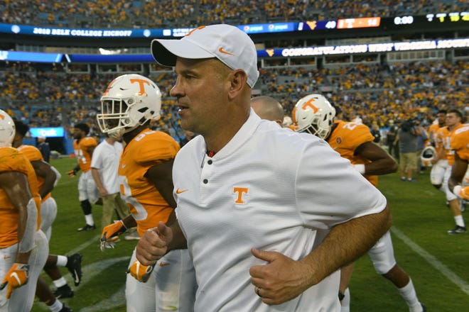 Tennessee Head Coach Jeremy Pruitt leaves the field after their 40-14 loss to West Virginia in the Belk College Kickoff game in Charlotte, NC Saturday, September 1, 2018.